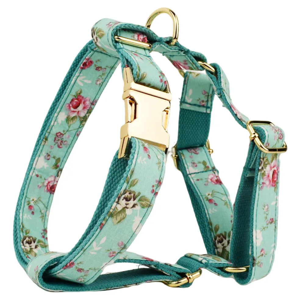 Rose pattern dog collar set with green background including collar, leash, and detachable bow