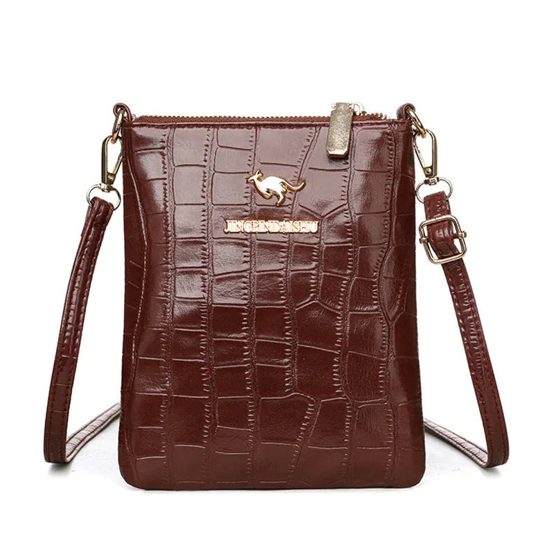 Soft square black PU leather shoulder messenger bag with visible sewing thread detail and outer pocket