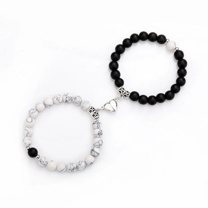Magnetic couple bracelets with natural zircon stones and vibration feature