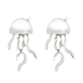 Alloy jellyfish tassel necklace and earring set in electroplated white finish on display