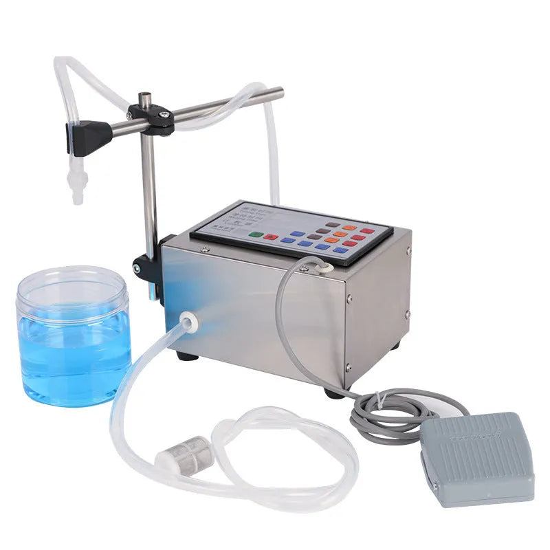 CNC filling machine GFK-280 model on work surface with digital display and dispensing nozzles