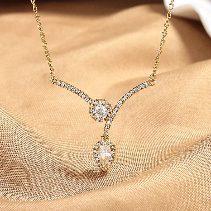 Micro Inlaid Zircon Water Drop V-shaped Necklace in silver and gold finishes