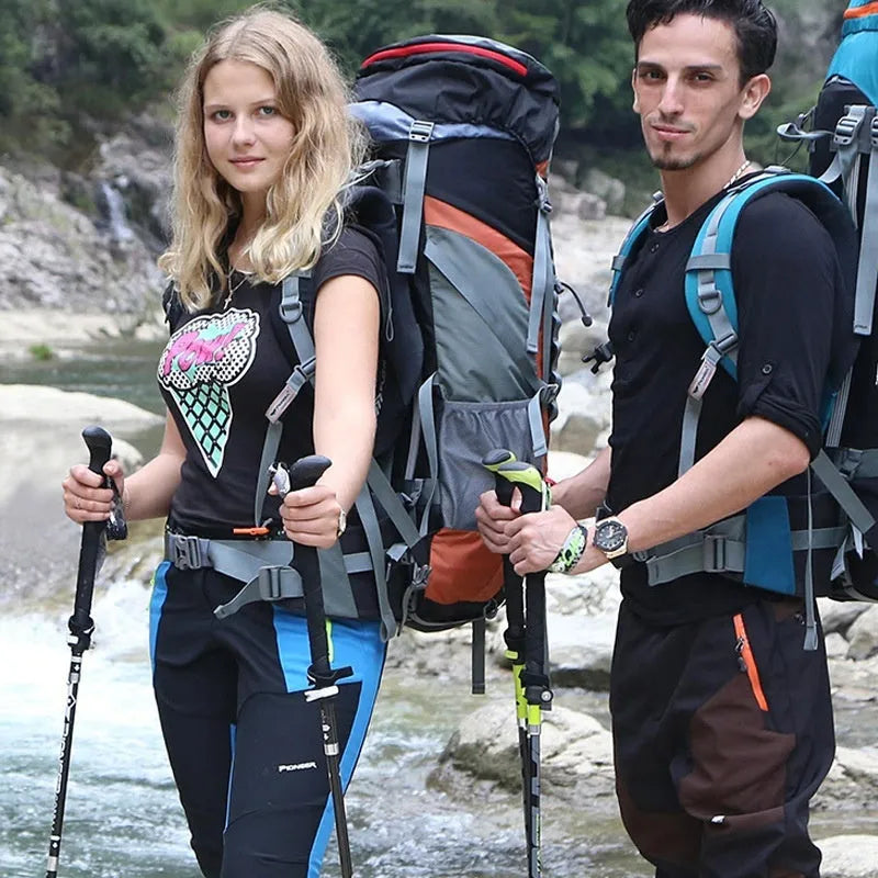 Carbon fibre folding climbing cane with tungsten steel tip shown extended and collapsed