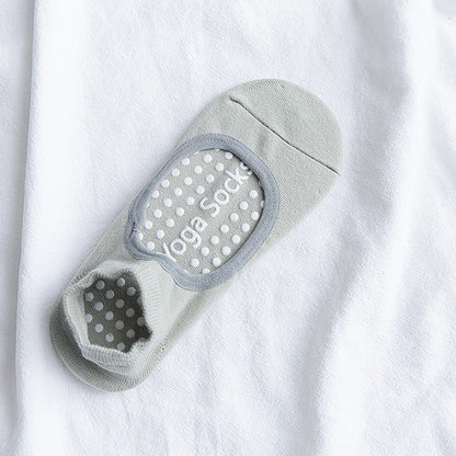 Yoga socks with silicone grip patterns on sole in bean green colour