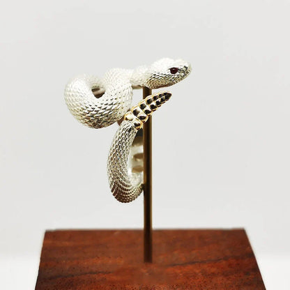 Adjustable copper snake ring in black and white with gold tail options