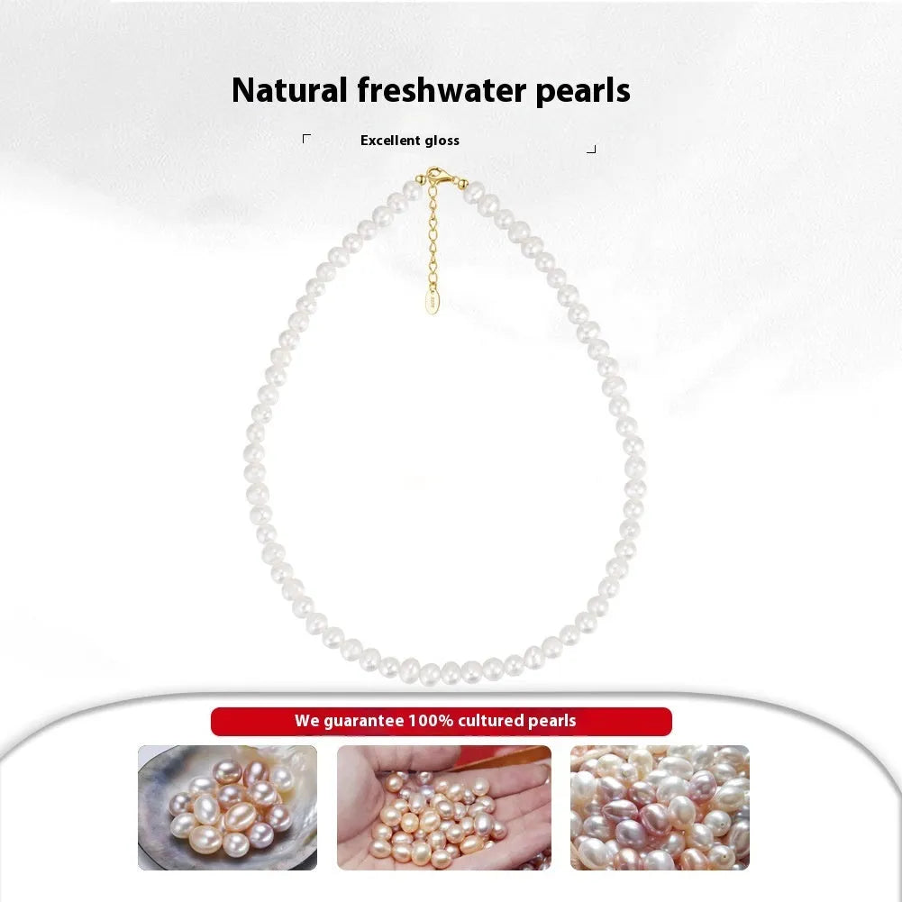 Women's silver adjustable chain necklace with a single natural freshwater pearl.