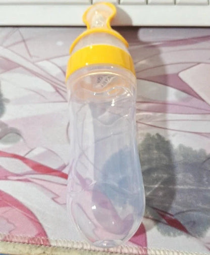 Baby Spoon Bottle Feeder in various colors for easy, safe feeding