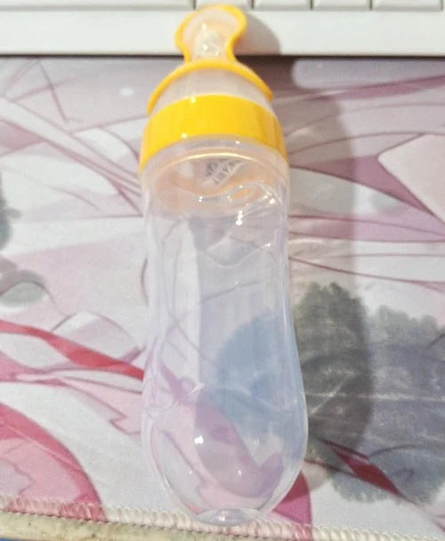 Baby Spoon Bottle Feeder in various colors for easy, safe feeding
