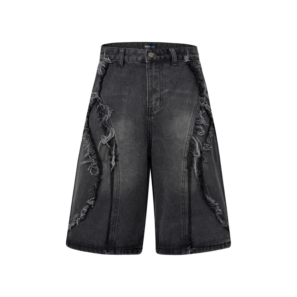 Distressed denim shorts with raw edge detailing in straight leg cropped cut
