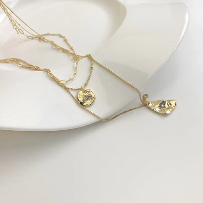 Multi-layer unisex clavicle chain with geometric triangle pendant and snake bones chain