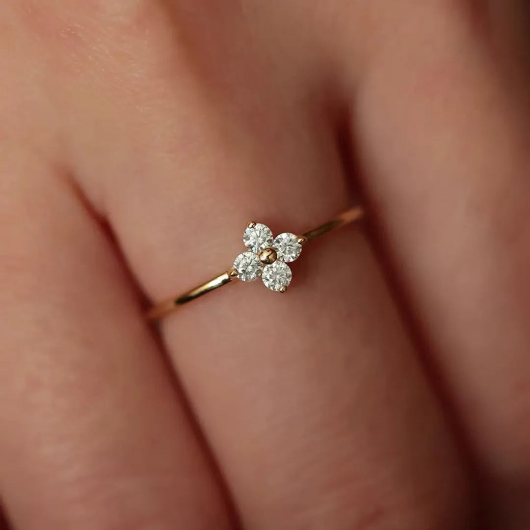 Champagne copper adjustable ring with four-leaf clover and rhinestone flower detail