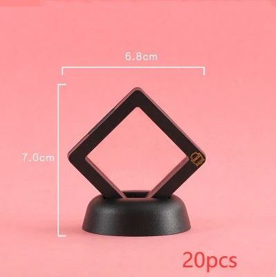 3D floating jewelry display stand showcasing earrings and coins in mid-air