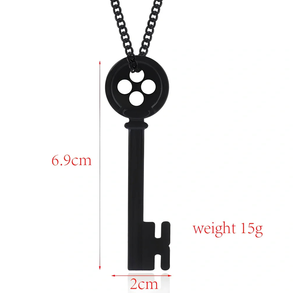 Unisex black key pendant necklace with star details on alloy chain, electroplated for durability, 45-50cm length