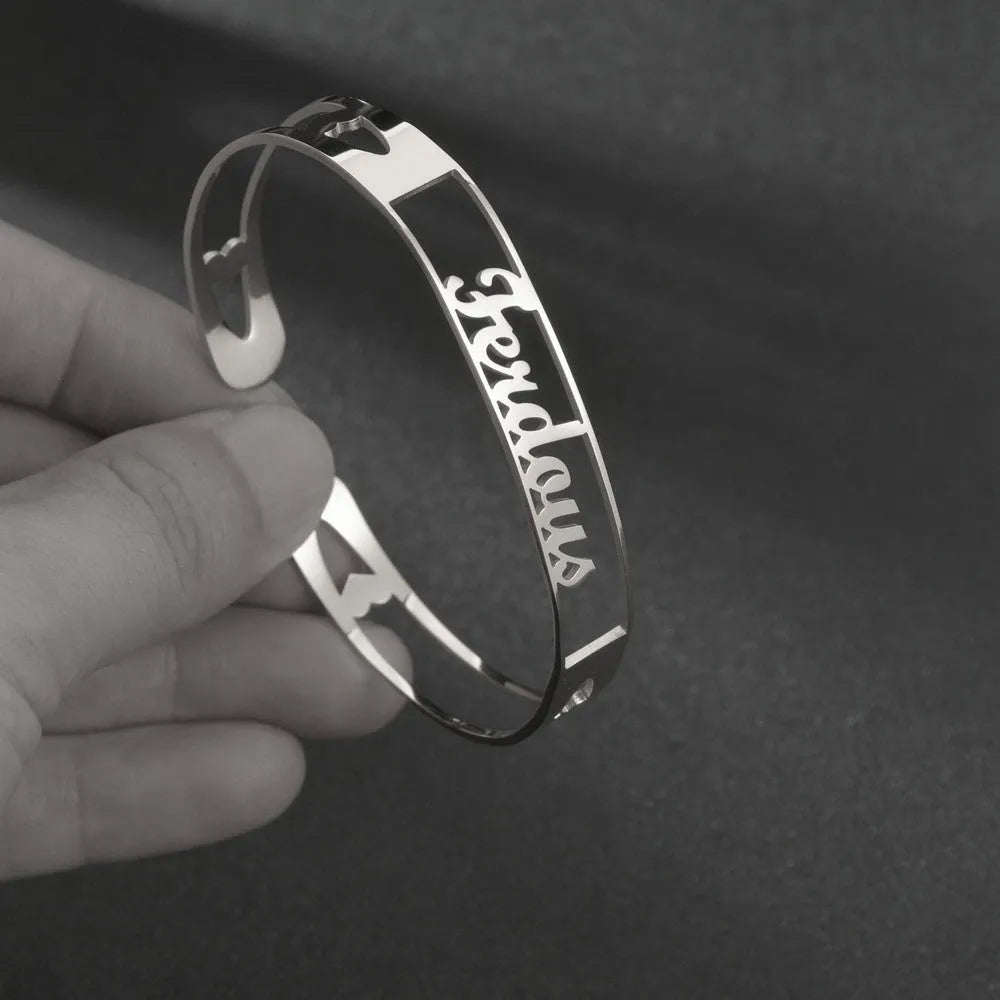 Custom name bracelet in stainless steel, silver finish, medium width, personalised engraving