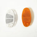 White and yellow plastic bicycle spoke reflector for wheel safety, dimensions 7.2cm long by 3.5cm wide.
