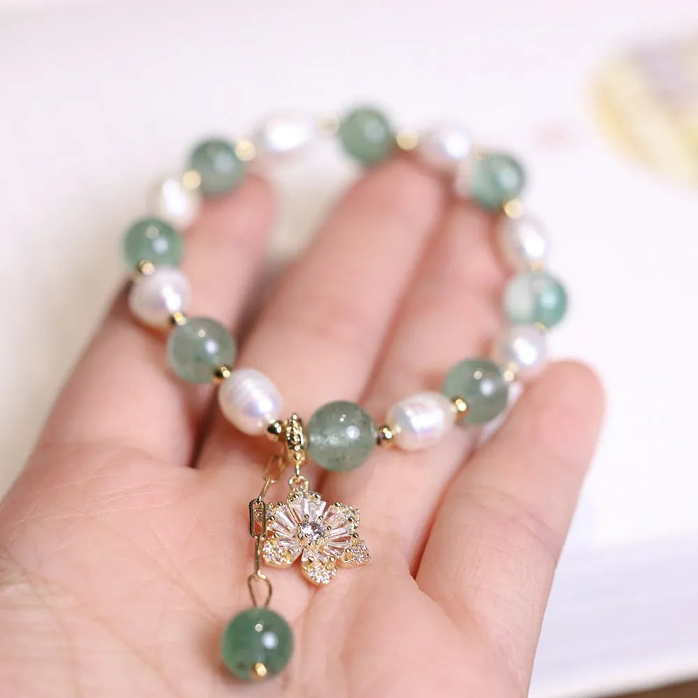 Green strawberry freshwater pearl bracelet with Chinese geometric patterns and peace buckle clasp
