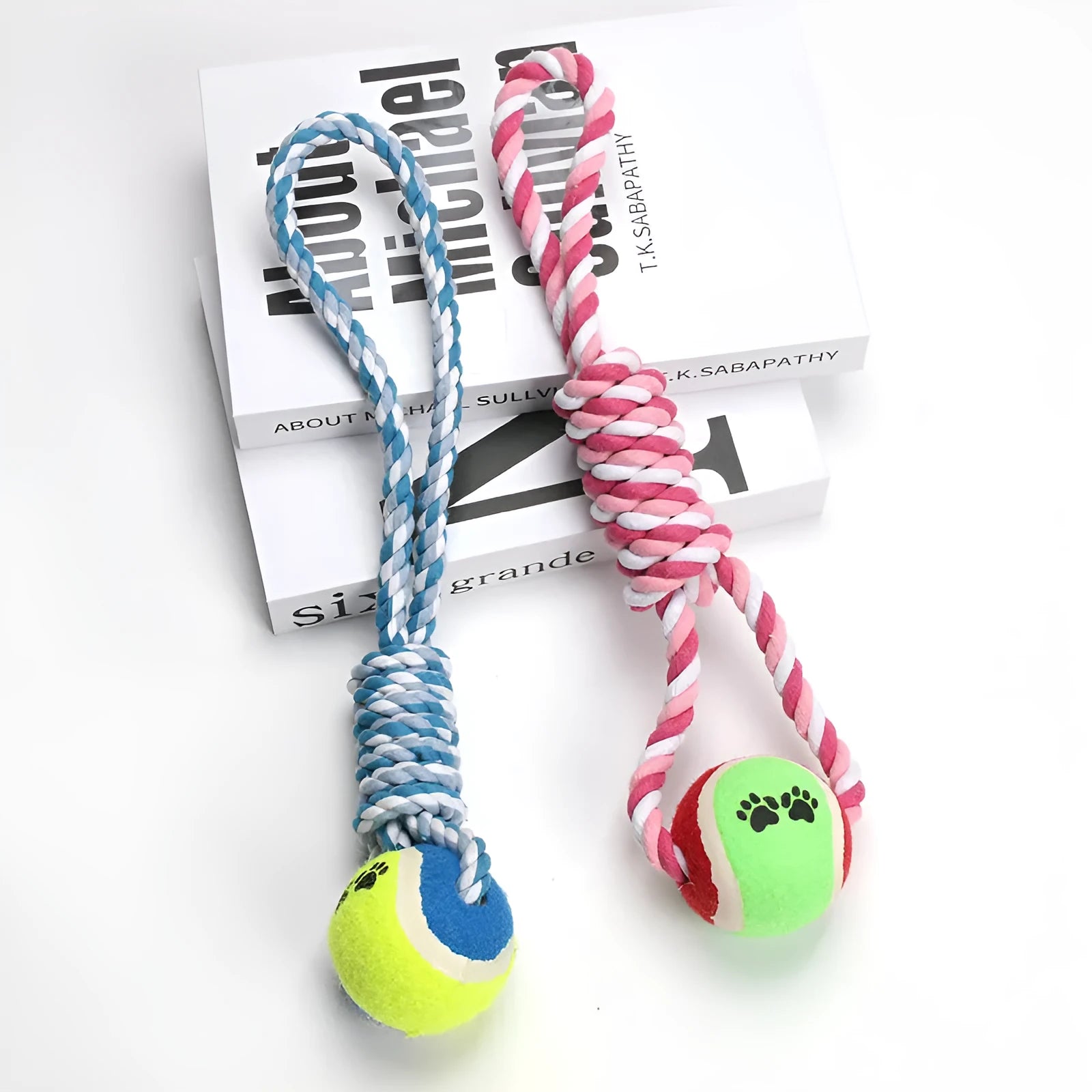 Red, white and blue woven cotton string dog toy measuring 38cm in length