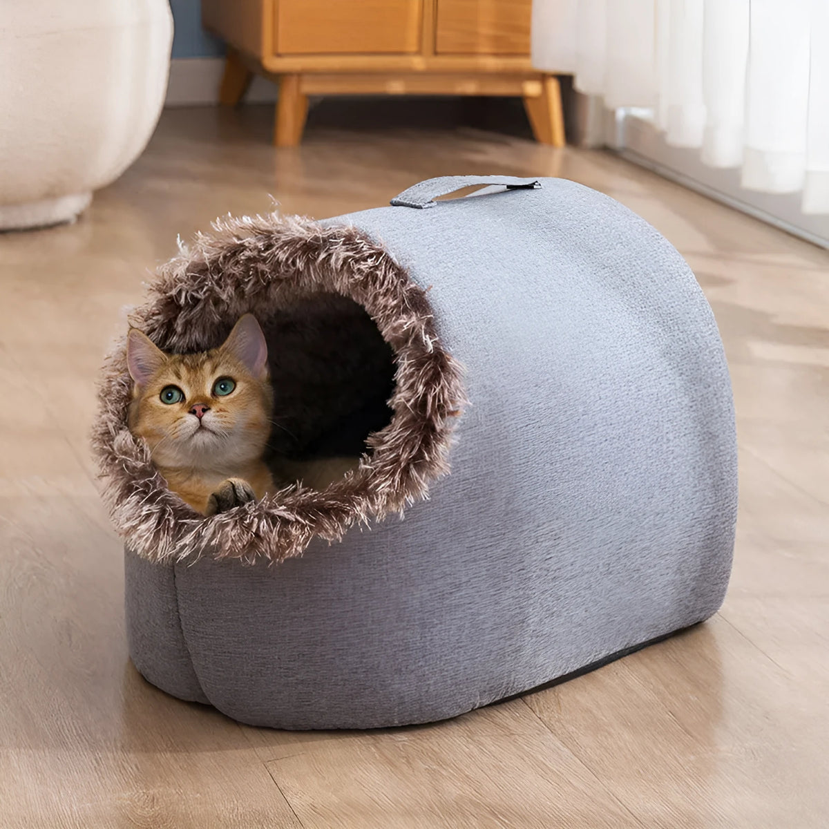 Grey fleece-lined closed cat sleeping bag bed shown next to a coffee-coloured one.