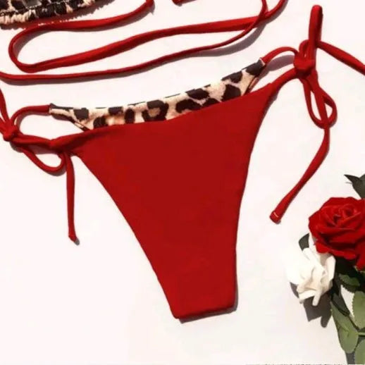 Women's leopard print halter bikini with lace-up front closure