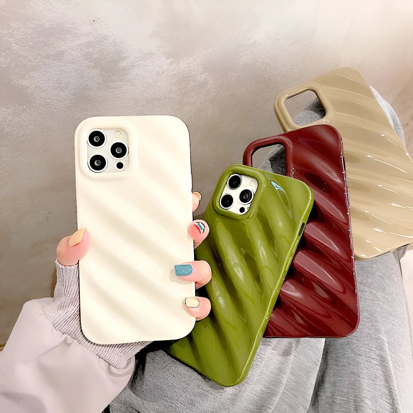 Nordic style pleated silicone phone case for Apple iPhone on a table