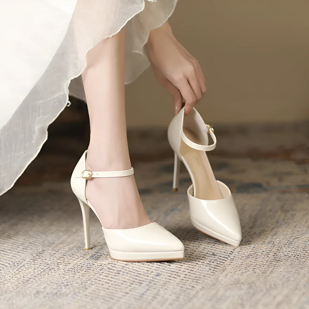 Pointed-toe platform high heels with 10.5cm stiletto heel in leather upper and hollow detail