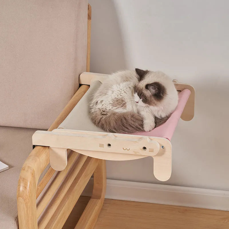 Solid wood raised pet bed with removable cushion in plaid pattern for cats and dogs
