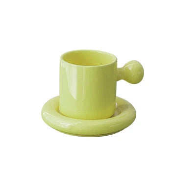 Creative Vitality Egg Yolk Cup Mug and Saucer Set in vibrant coconut milk-white, egg yellow, coral orange, and honeydew green colours