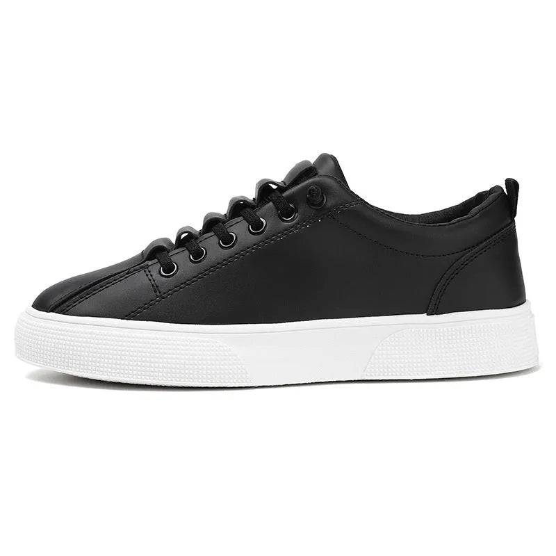 Men's black and white low top sports shoes with mesh and synthetic leather construction