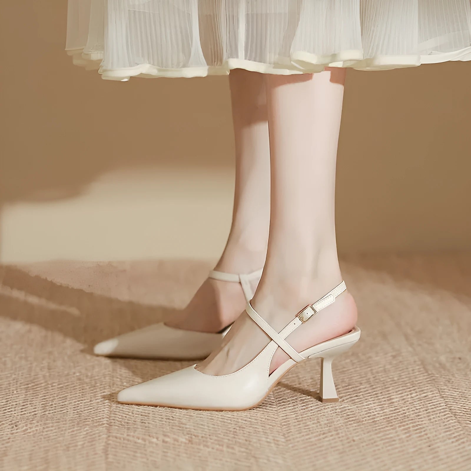 Spring women's pointed stiletto pump sandals in solid colour with rubber sole and imitation sheepskin lining, shown in apricot