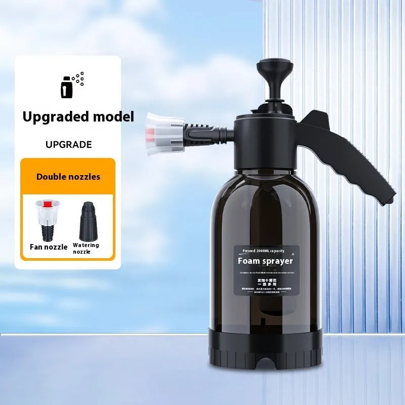 Black 2L hand-held foam watering can sprayer with ergonomic handle and pump mechanism.