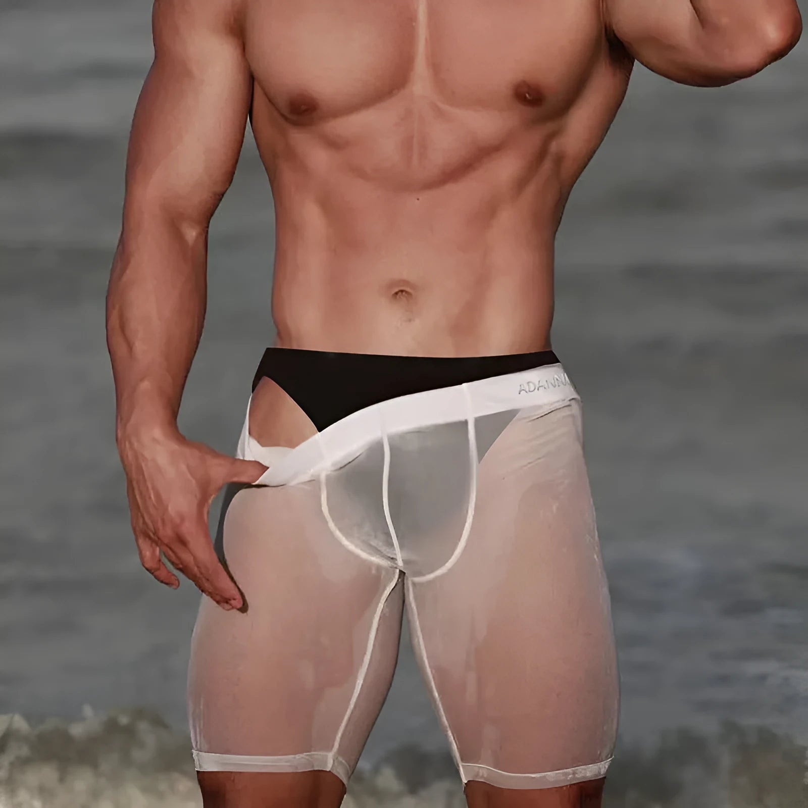 Men's seamless mesh shorts in black, shown flat