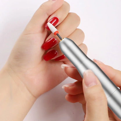 Pink USB-charging electric nail drill machine with 6 grinding heads and power cord