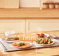Elegant grey silicone flexible foldable electric warm chopping board with digital display on a kitchen counter