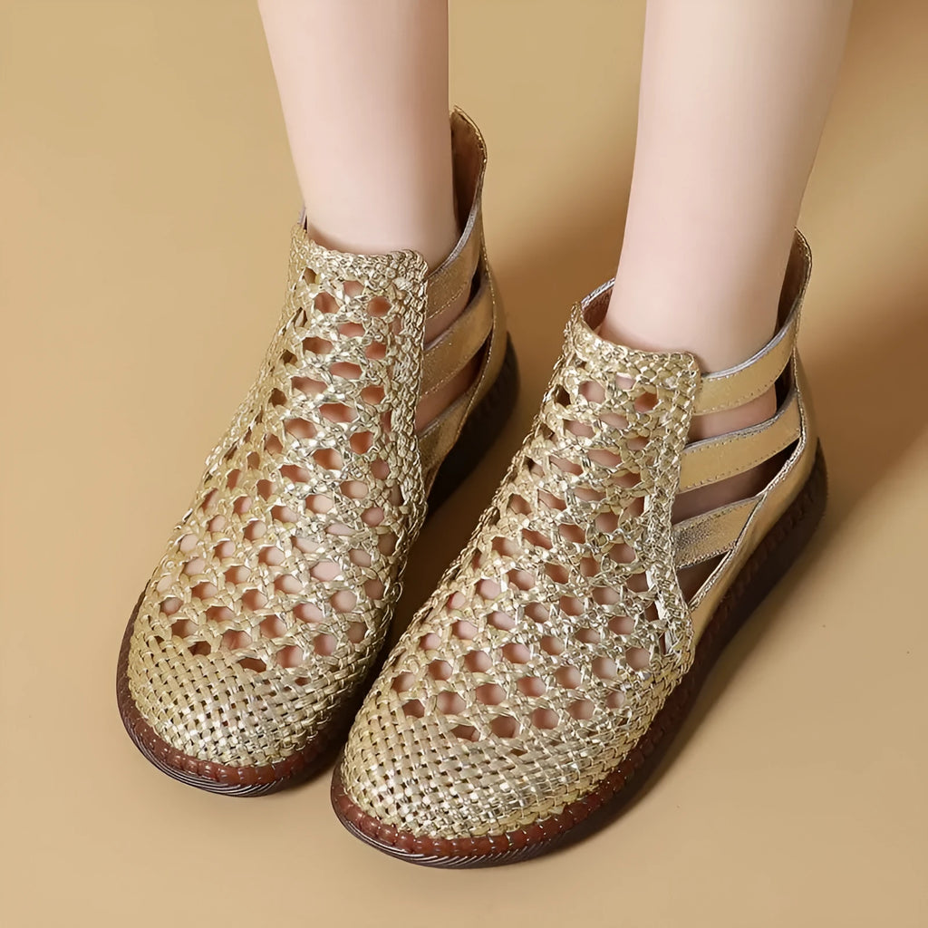 Gold and white women's flat sandals with hollow-out PU upper and soft TPR sole.