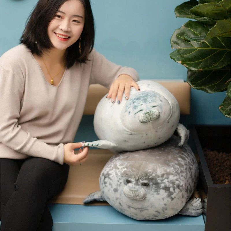 Large grey and white seal plush toy in various sizes for decoration and cuddling