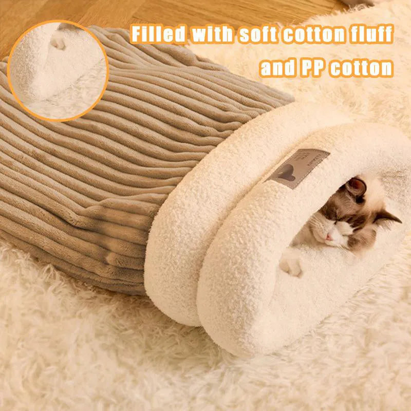 Brown semi-enclosed pet sleeping bag with lambswool insulation on wooden floor