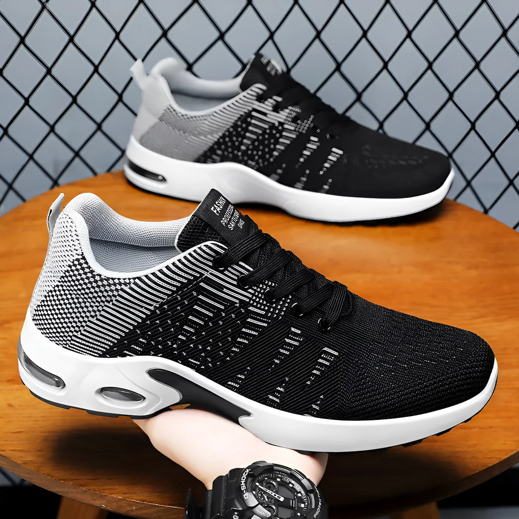 Men's low-top casual sneakers in black and blue with Flyknit mesh upper and flat sole.