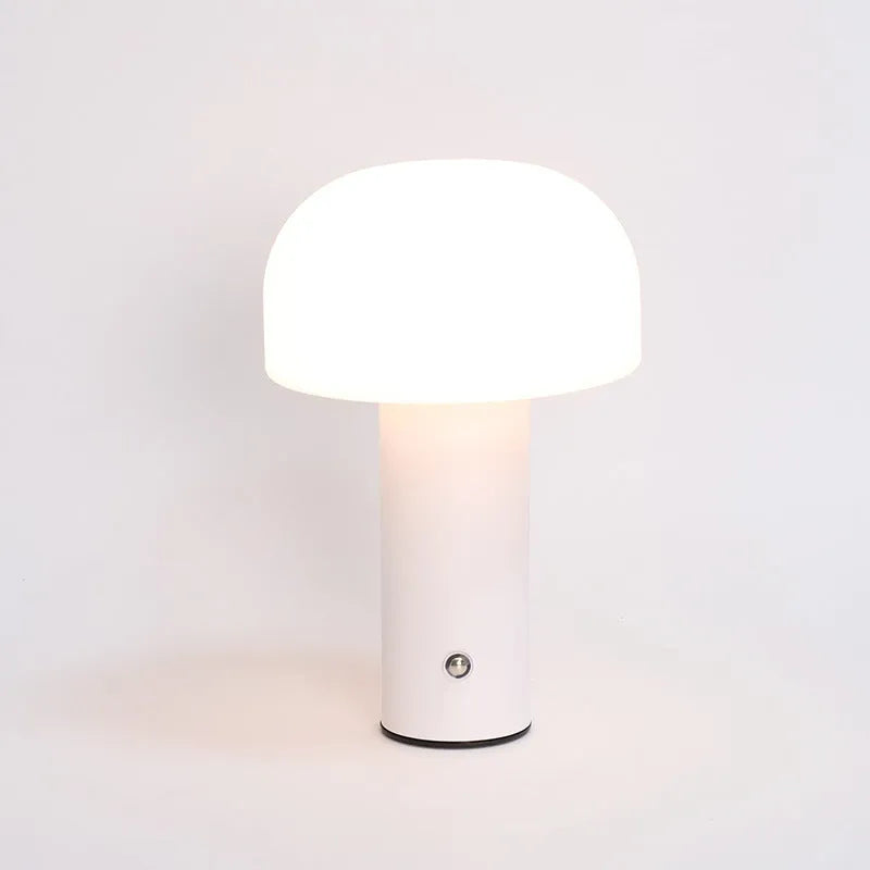 USB-powered table lamp with charging port in black, green, orange, or white colour options.