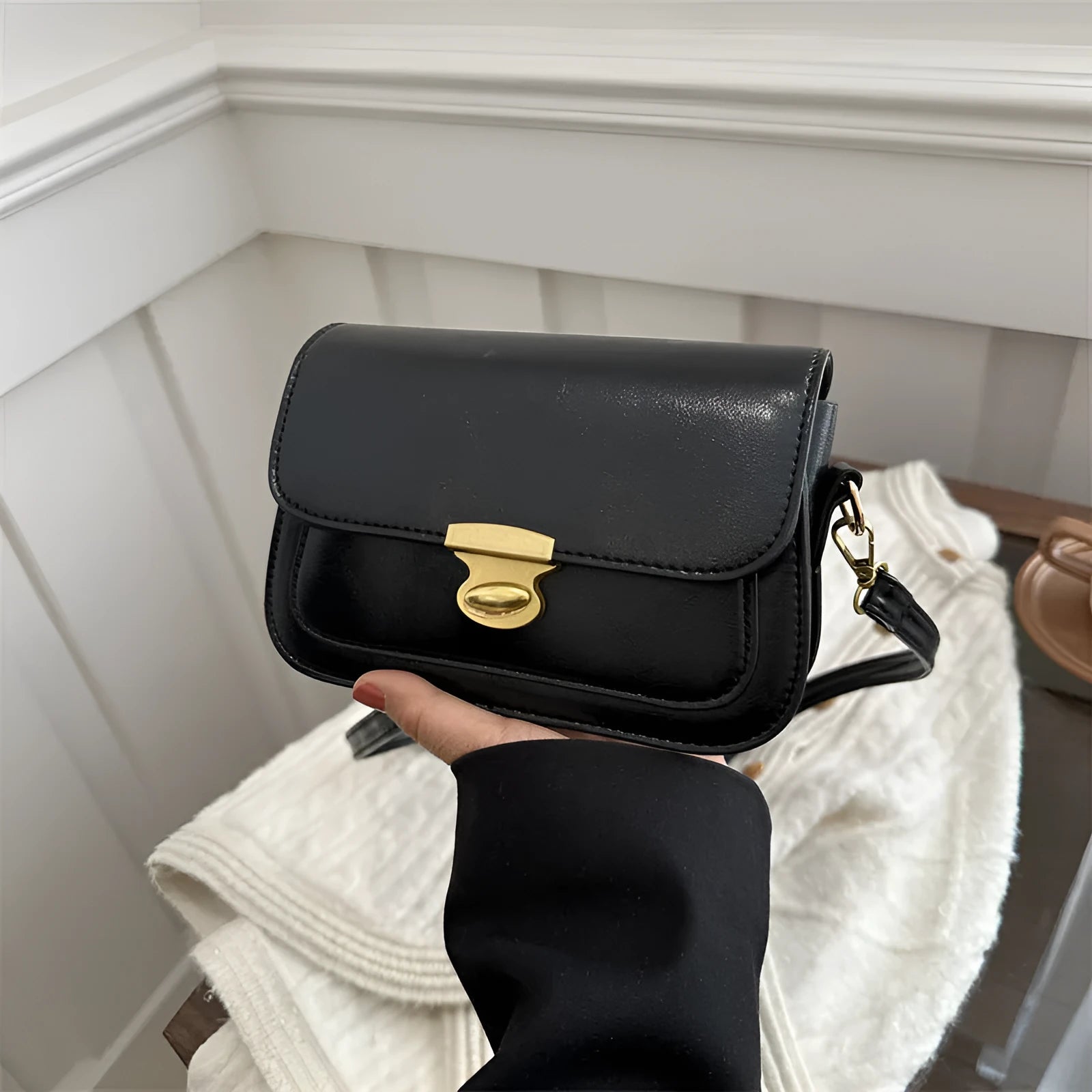 Small soft PU leather square handbag in retro design, shown in a neutral colour.