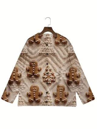 Loose-fit digital printed top with lapel collar in assorted sizes on a hanger.