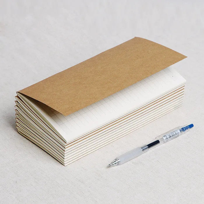 Travel cowhide diary refill inner core showing 11x21cm size and saddle stitch binding