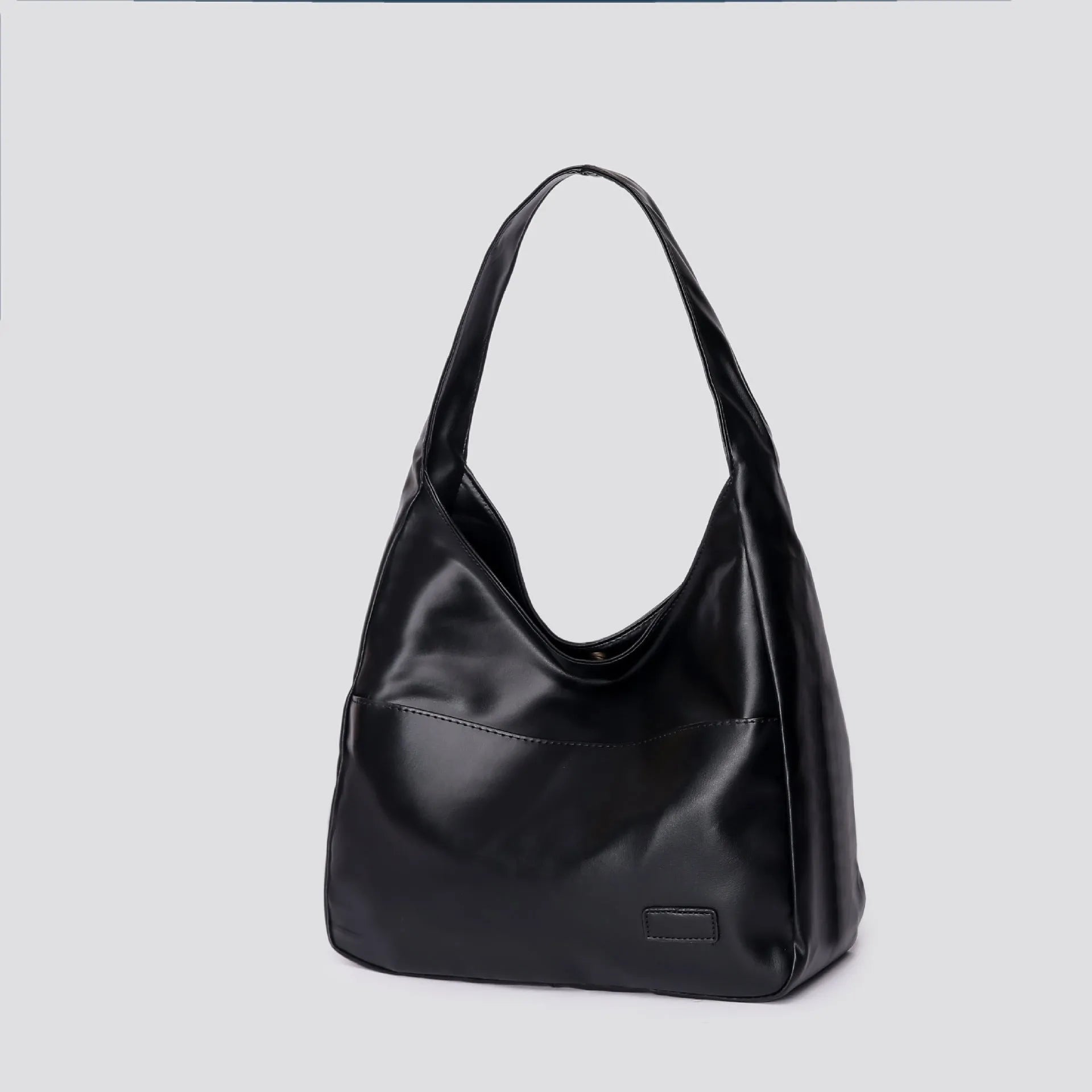 Women's soft PU leather retro shoulder bag in black with single strap and open pocket.