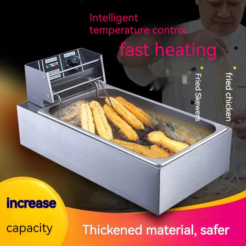 Stainless steel commercial deep fryer with oil tank, lid, and two frying baskets
