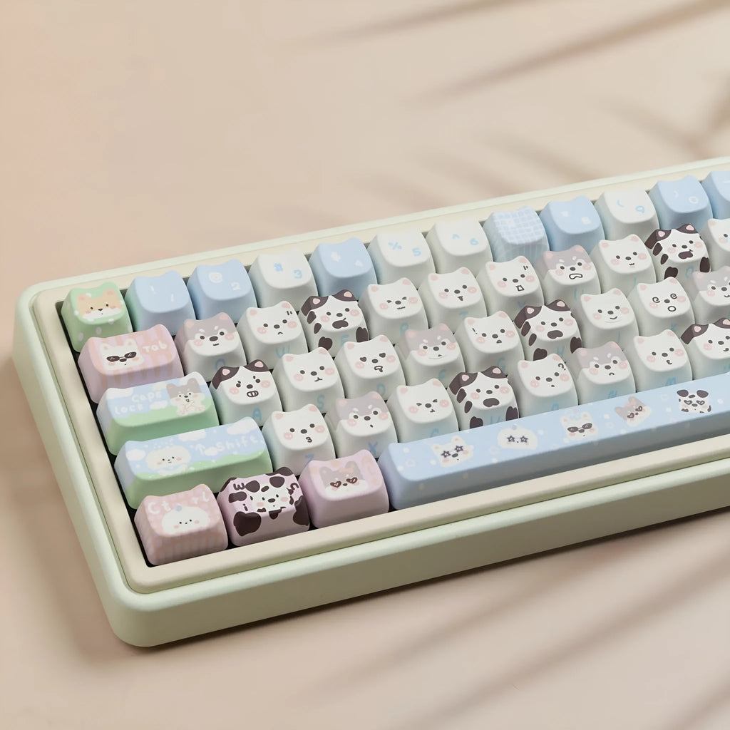 PBT sublimation keycap set showing colourful cat and puppy designs for mechanical keyboards