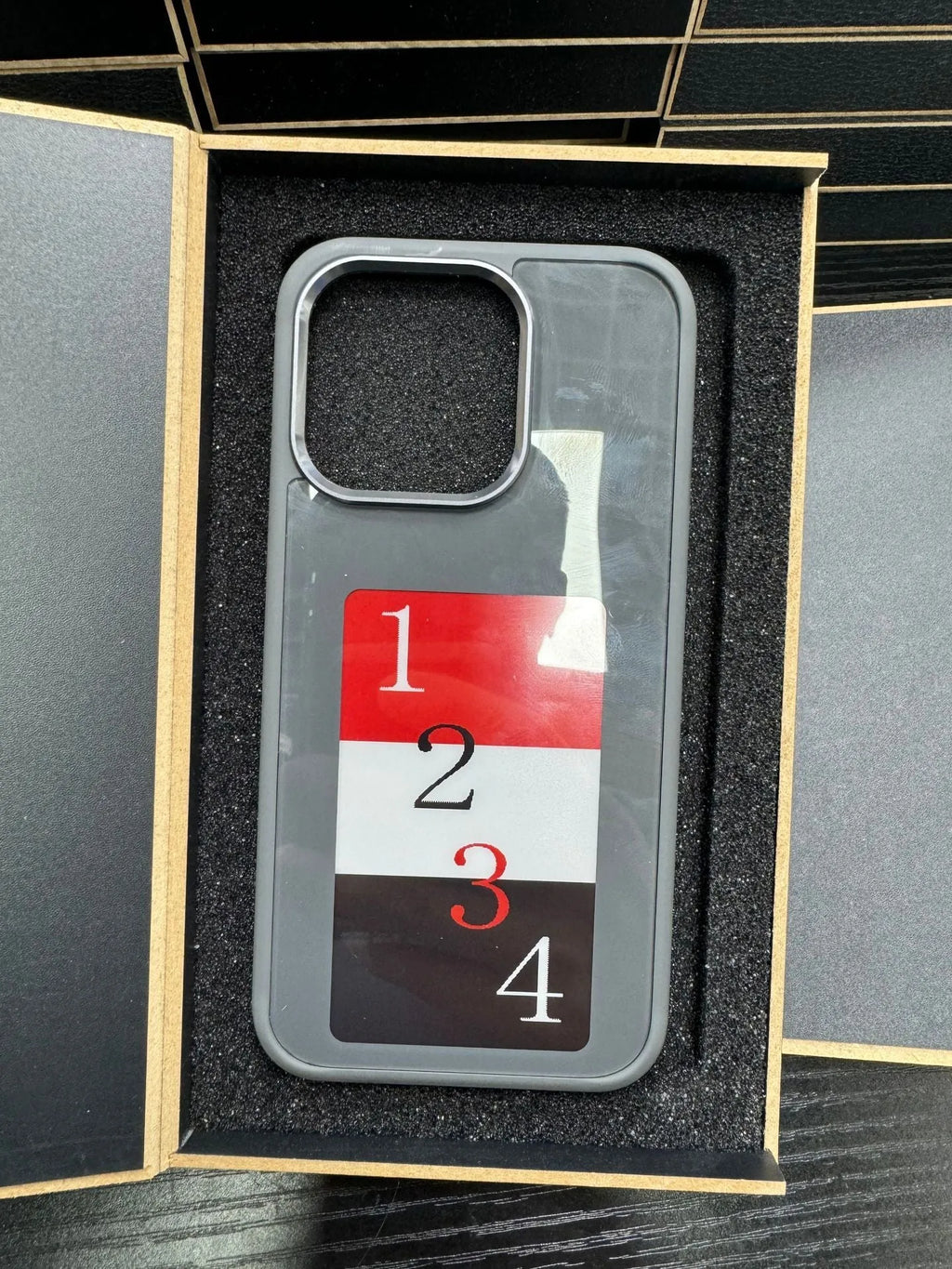 Black e-ink screen phone case with battery-free projection for Apple iPhone, TPU material, mirror finish