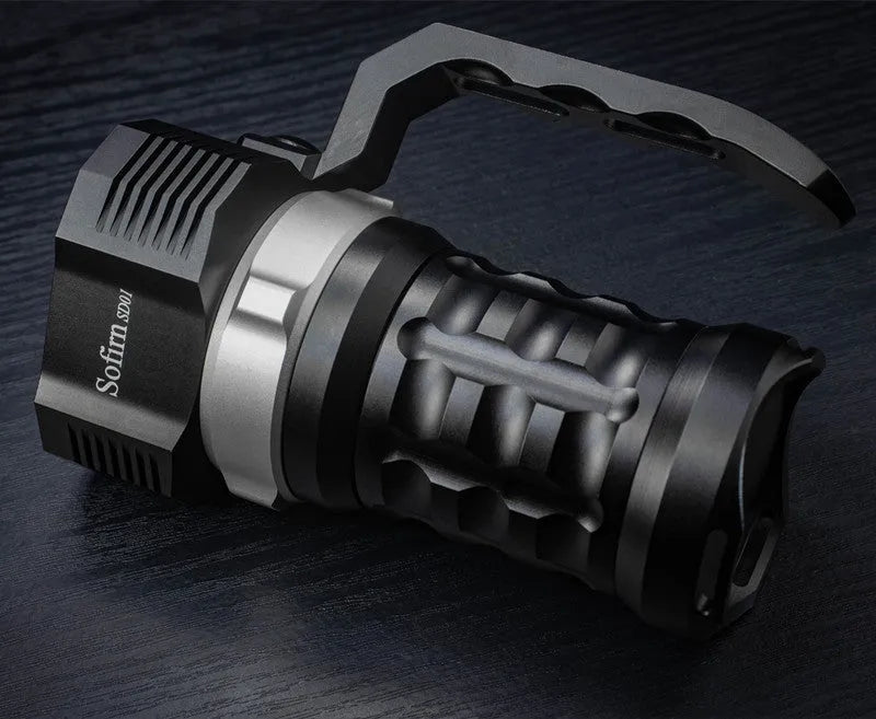 Aluminium alloy diving flashlight showing 18cm length, displayed with optional battery charger kit.