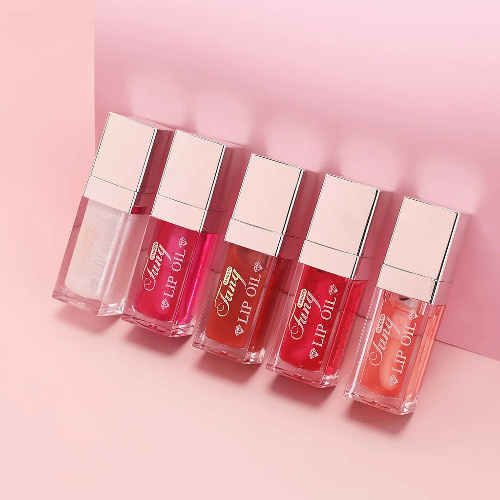 Five bright coloured mint lip gloss tubes showing shades Style001, Style006, Style007, Style012 and Style015