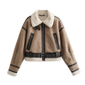 Women's loose long sleeve lamb wool splicing coat in khaki, with zipper front, on display as casual outerwear