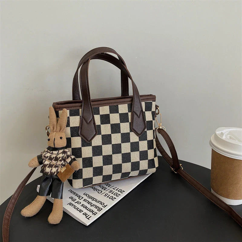 Stylish houndstooth messenger bags with adjustable straps, ample interior space, and a range of color options