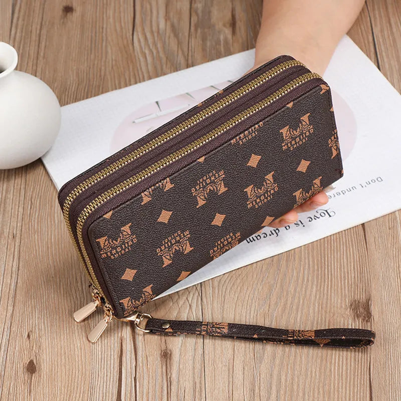 Long black PU leather wallet clutch with print detail showing mobile phone compartment and coin purse